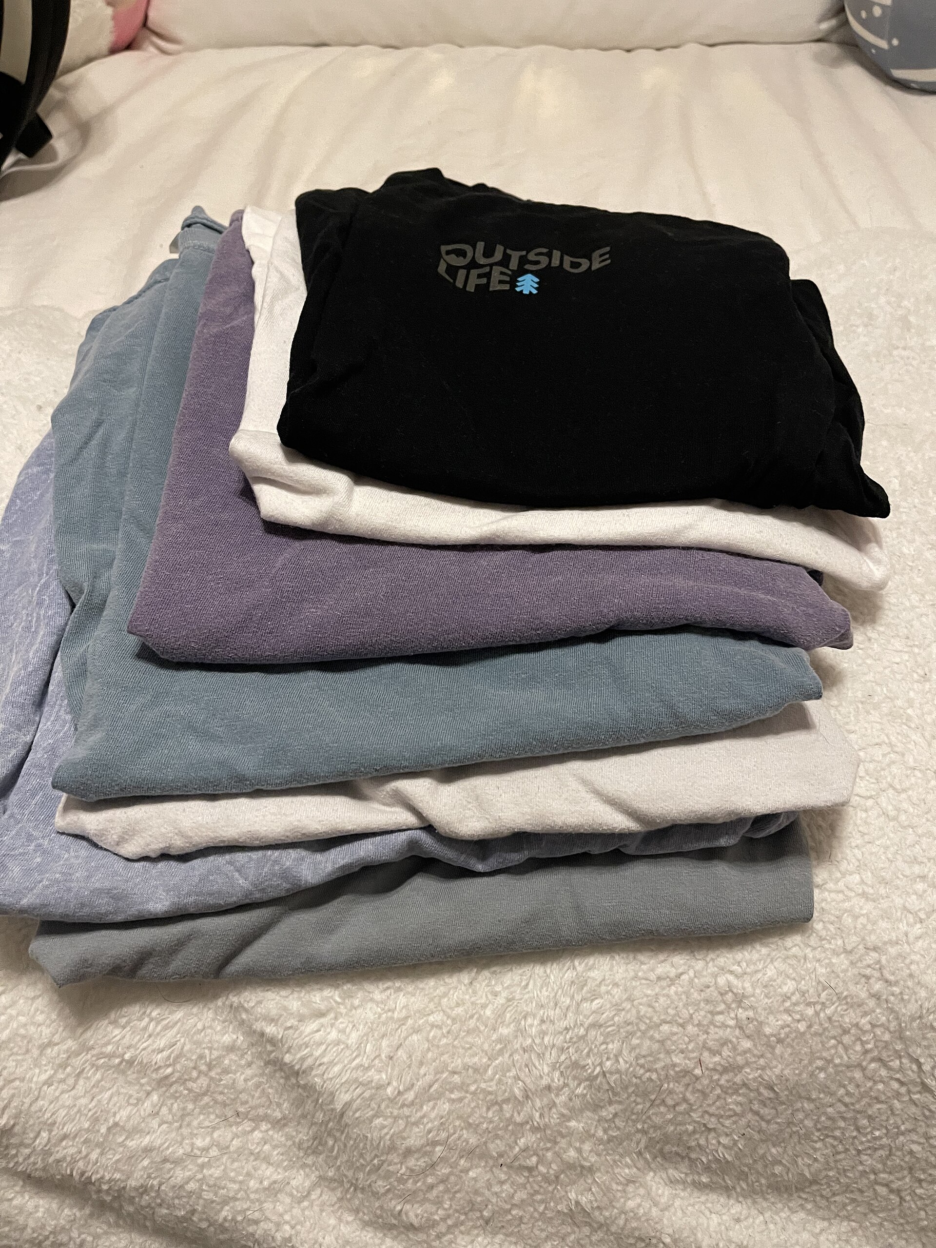 folded shirts shelf
