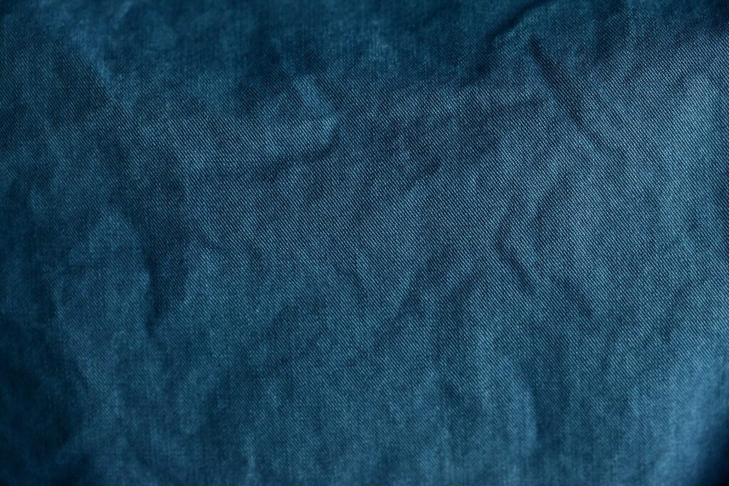 Trama ravvicinata di un tessuto di cotone con il filo e l'armatura in evidenza